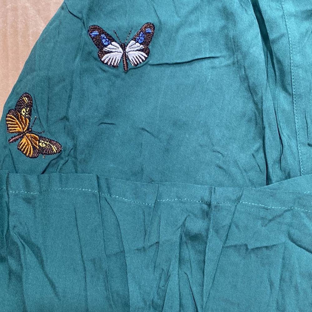 Wide leg green pants with butterflies. NWOT